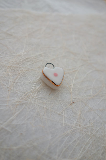 Pink dot ceramic charm necklace