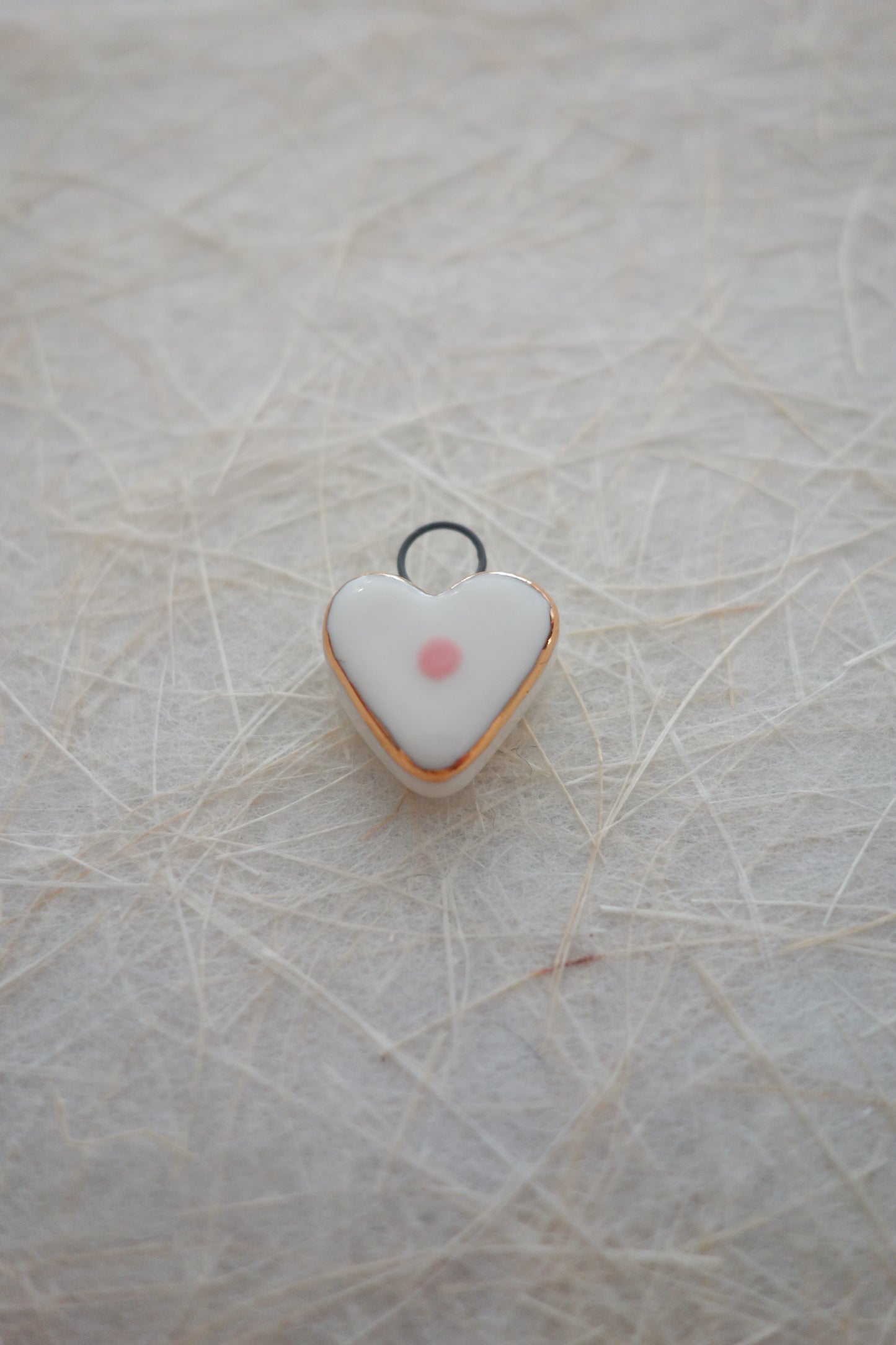 Pink dot ceramic charm necklace