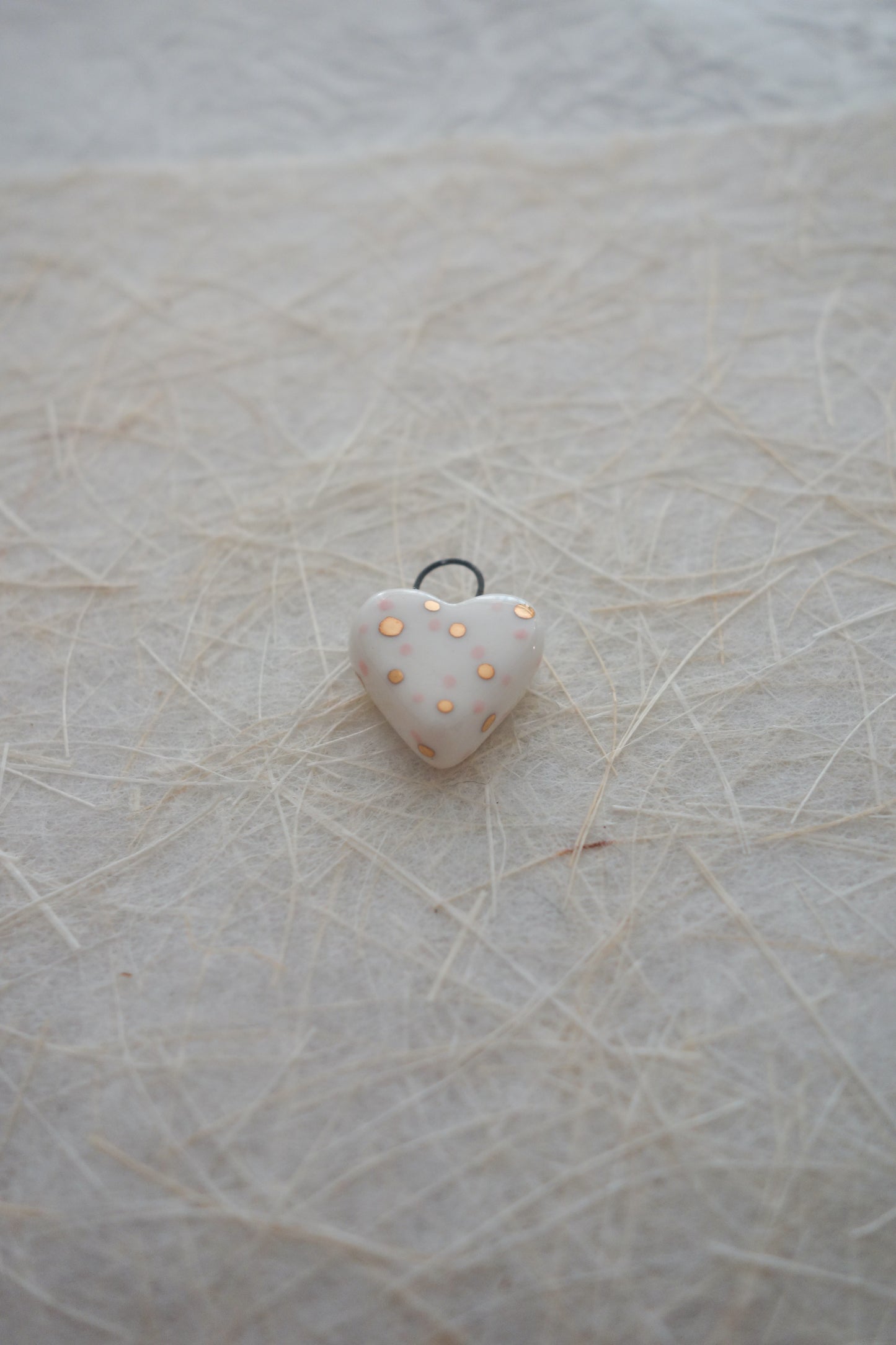 Polka dot ceramic charm necklace